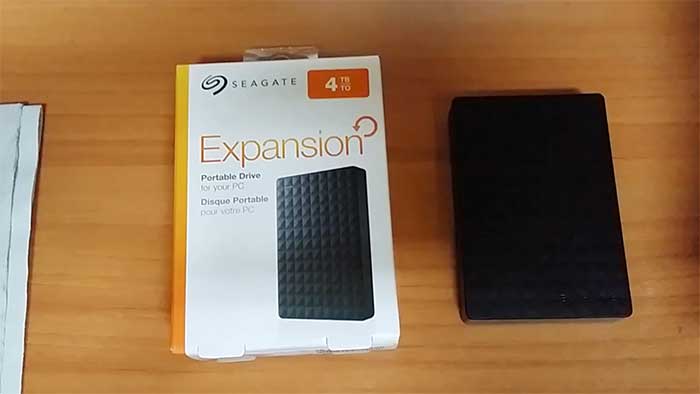 4to hard drive from seagate next to the retail packaging